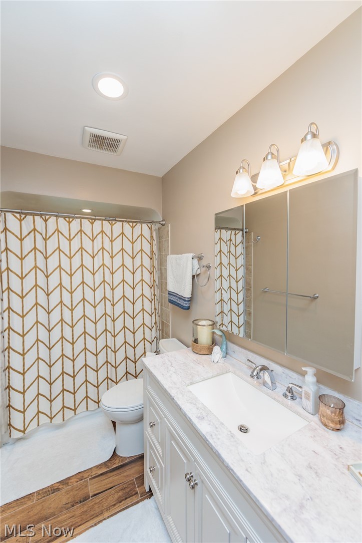 490 Trebisky Road Cleveland, OH 44143 - Photo 27 of 49 Bathroom featuring toilet and large vanity