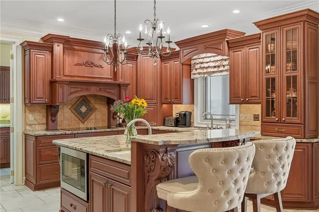 a dining table chair with a chandelier
