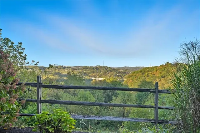 a view of a city and mountains