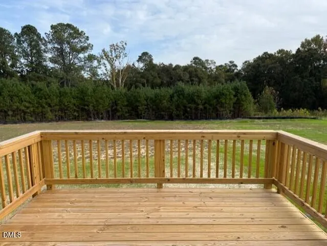 a view of wooden balcony with outdoor space