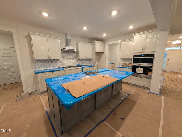 a view of a livingroom with furniture and window