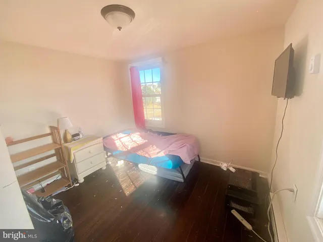 a bed room with a bed and a couch