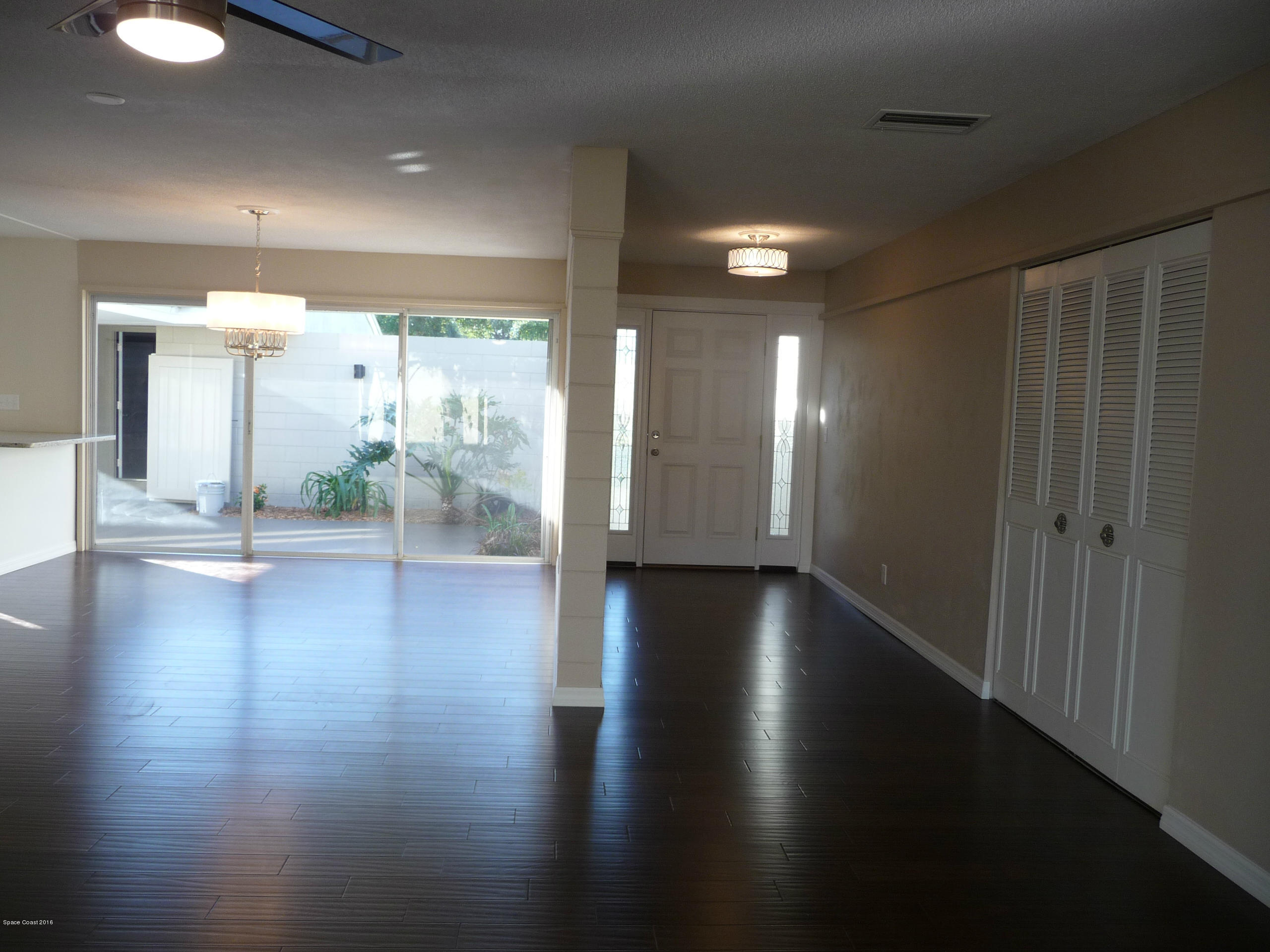 938 Brunswick Lane Rockledge, FL 32955 - Photo 13 of 57 Dining and front courtyard