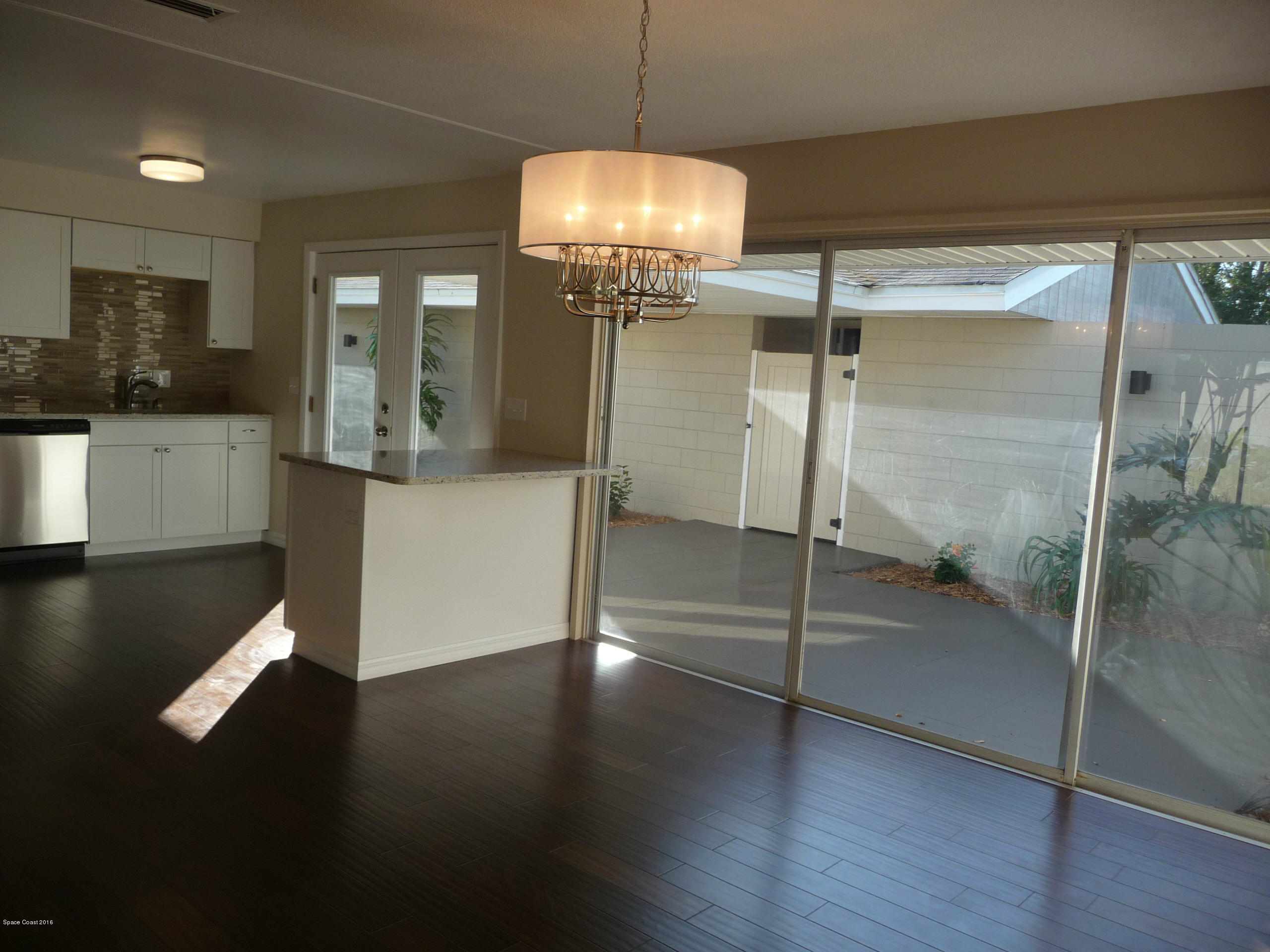 938 Brunswick Lane Rockledge, FL 32955 - Photo 21 of 57 Looking into front private courtyard