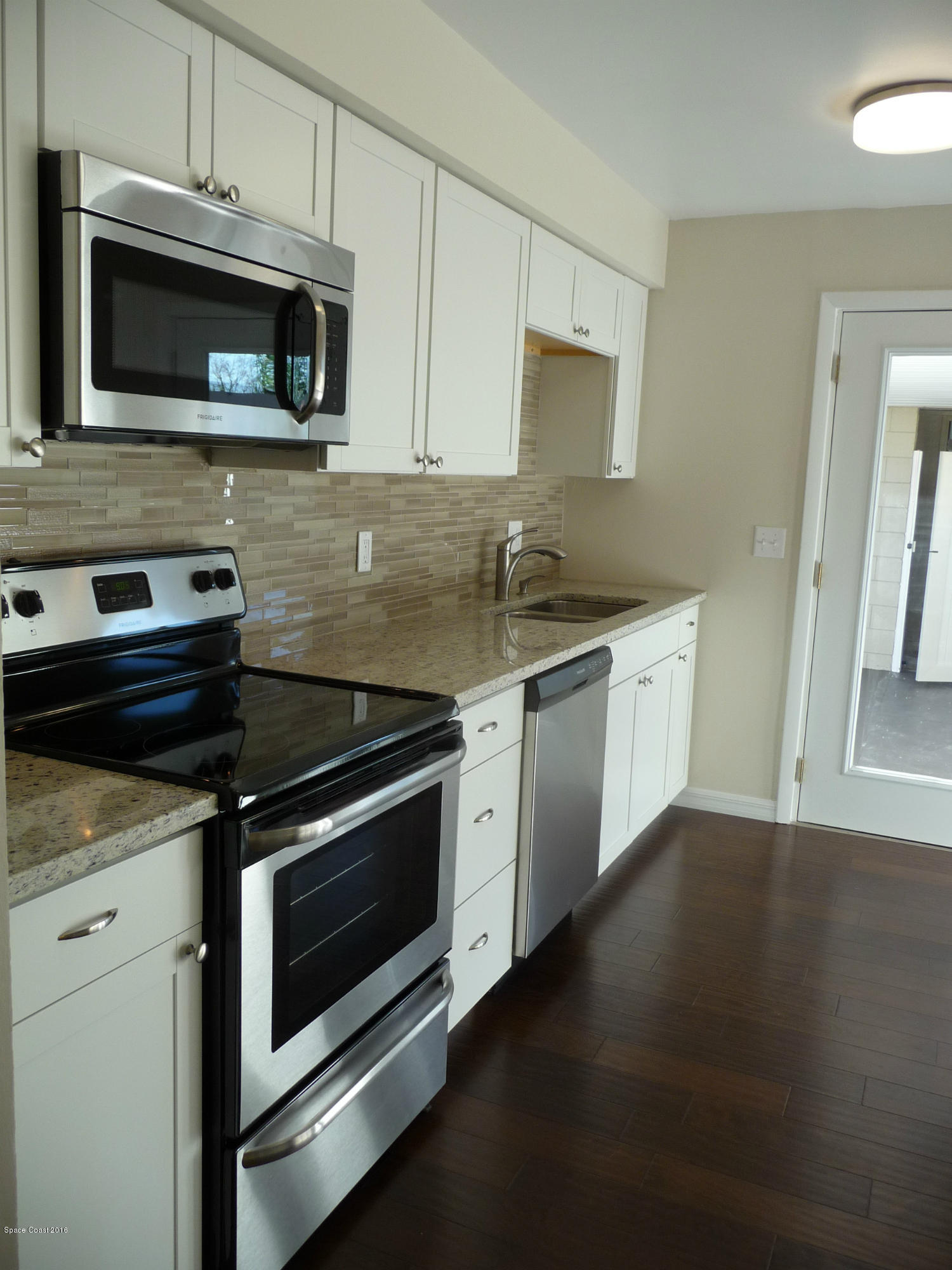 938 Brunswick Lane Rockledge, FL 32955 - Photo 24 of 57 Glass backsplash