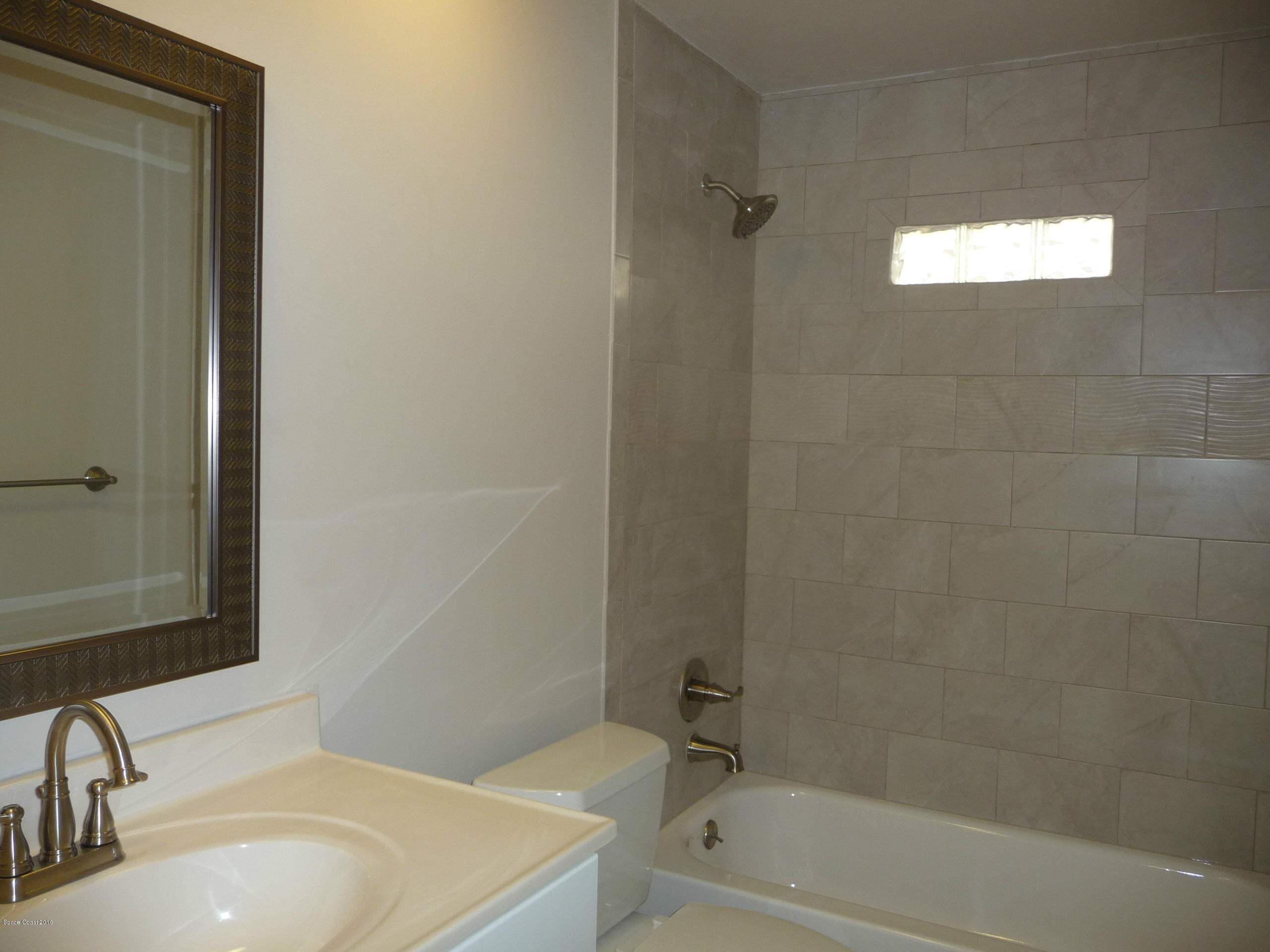 938 Brunswick Lane Rockledge, FL 32955 - Photo 27 of 57 Hall Bath new soft close doors/drawers