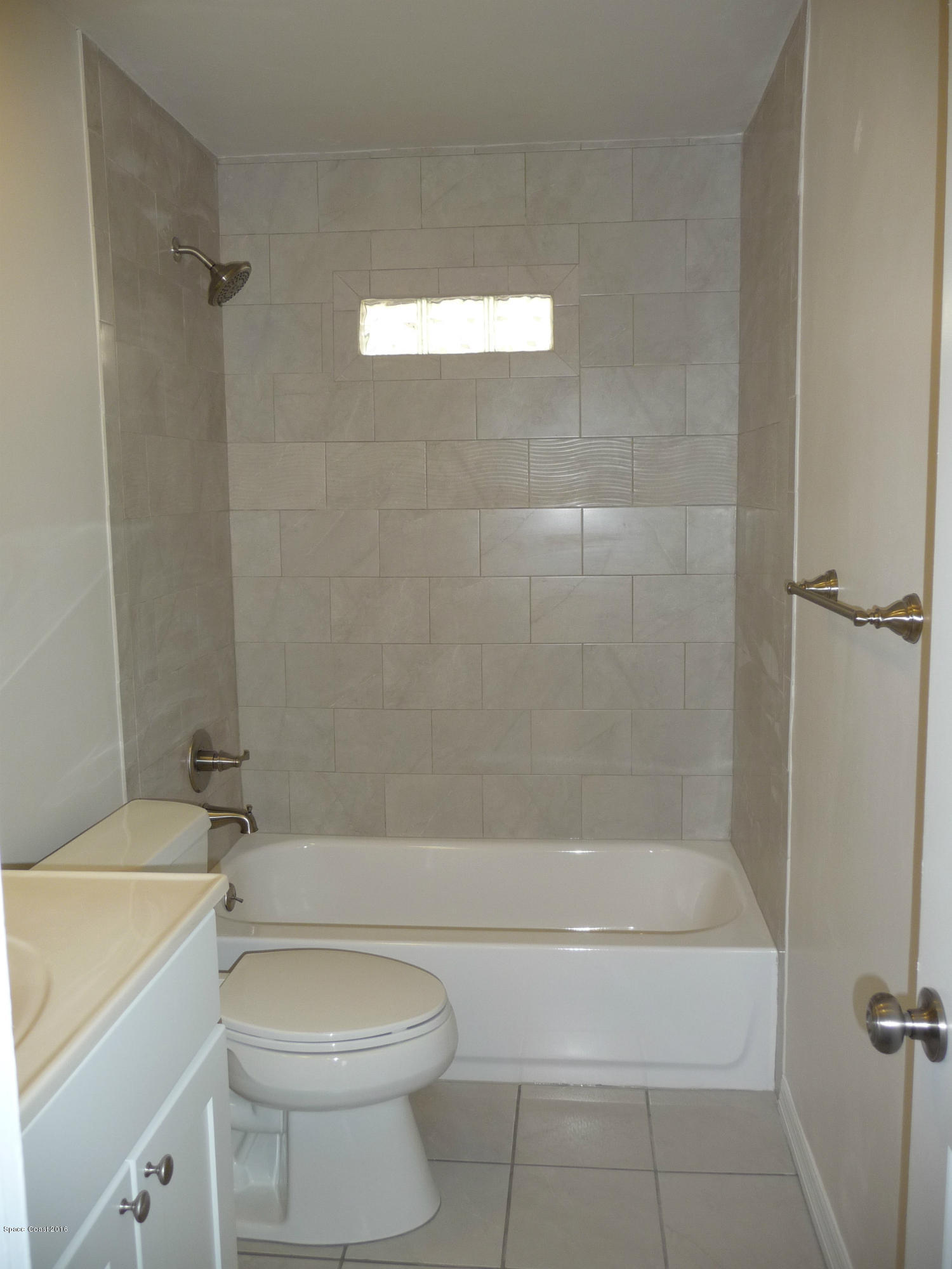 938 Brunswick Lane Rockledge, FL 32955 - Photo 28 of 57 Renovated hall Bath