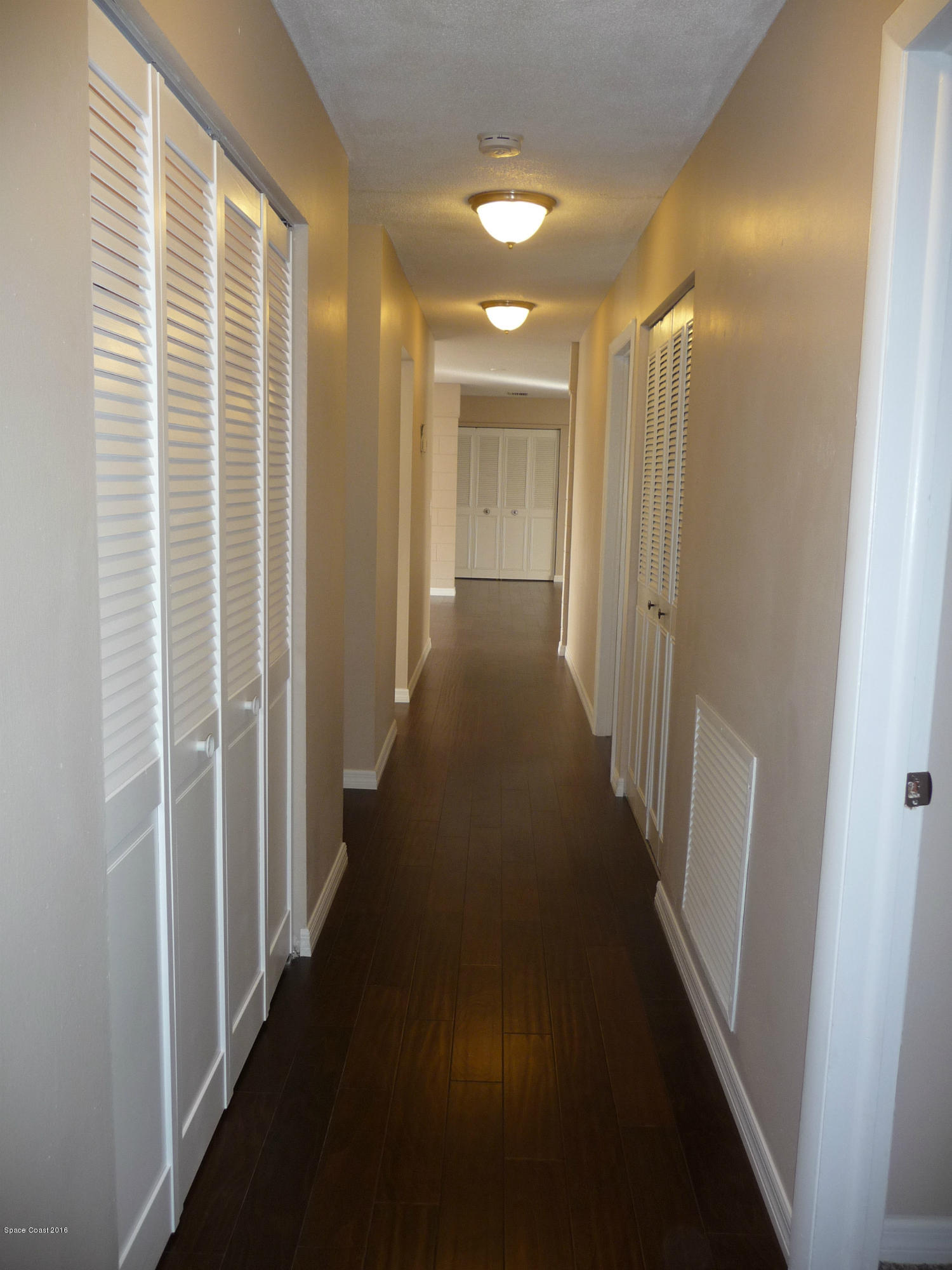 938 Brunswick Lane Rockledge, FL 32955 - Photo 37 of 57 Hall from other end looking to lv rm