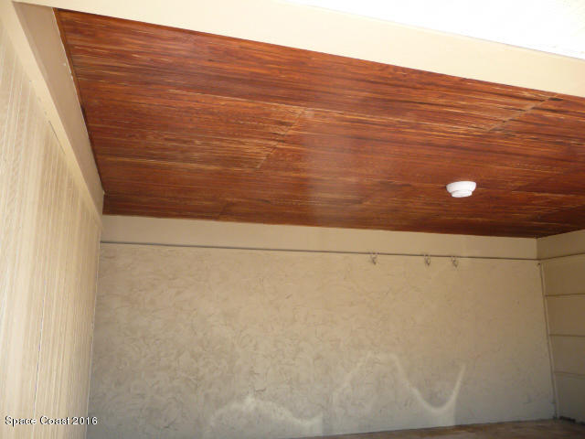 938 Brunswick Lane Rockledge, FL 32955 - Photo 5 of 57 Wood beam ceiling in carport