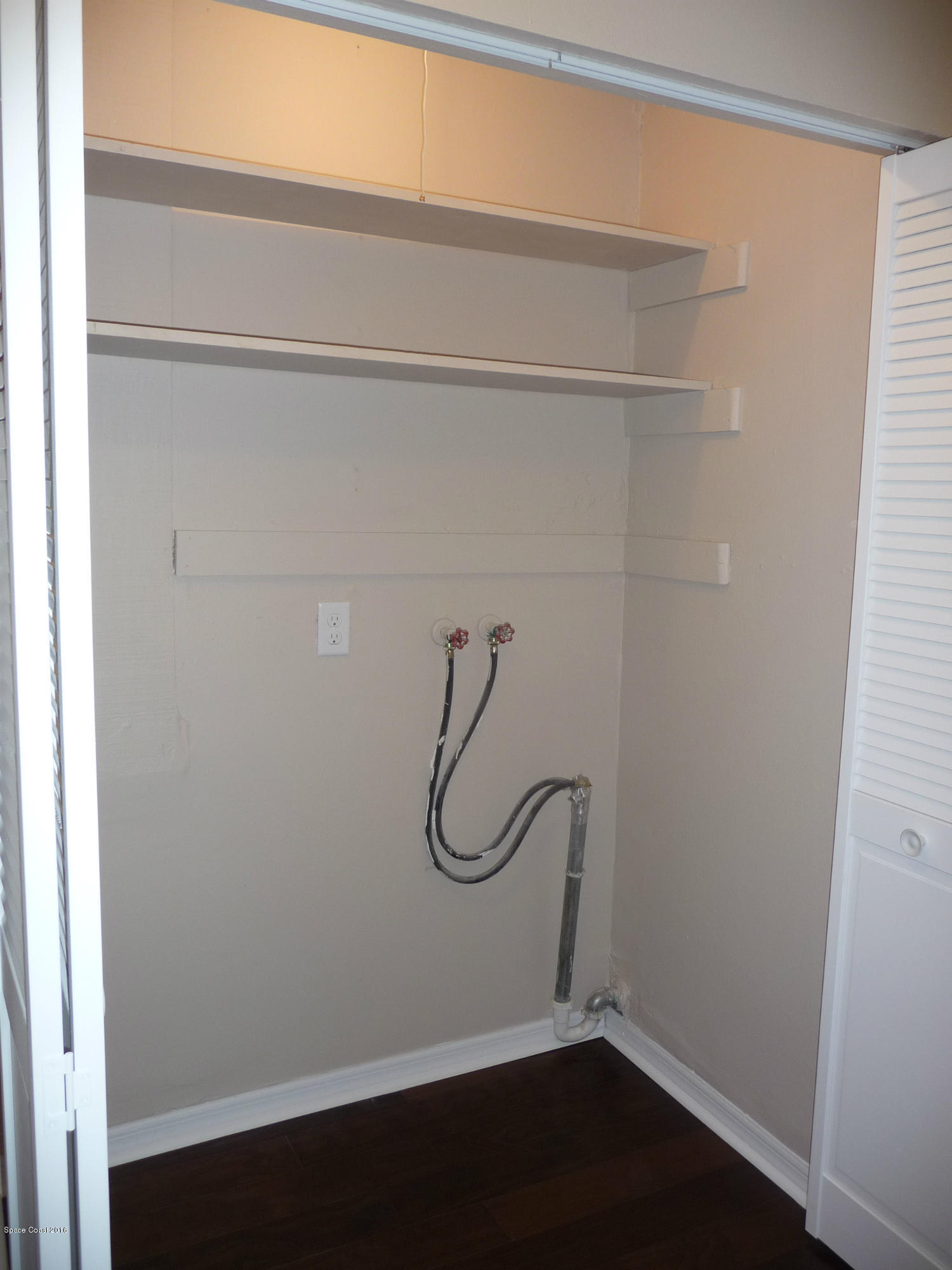 938 Brunswick Lane Rockledge, FL 32955 - Photo 40 of 57 Indoor laundry