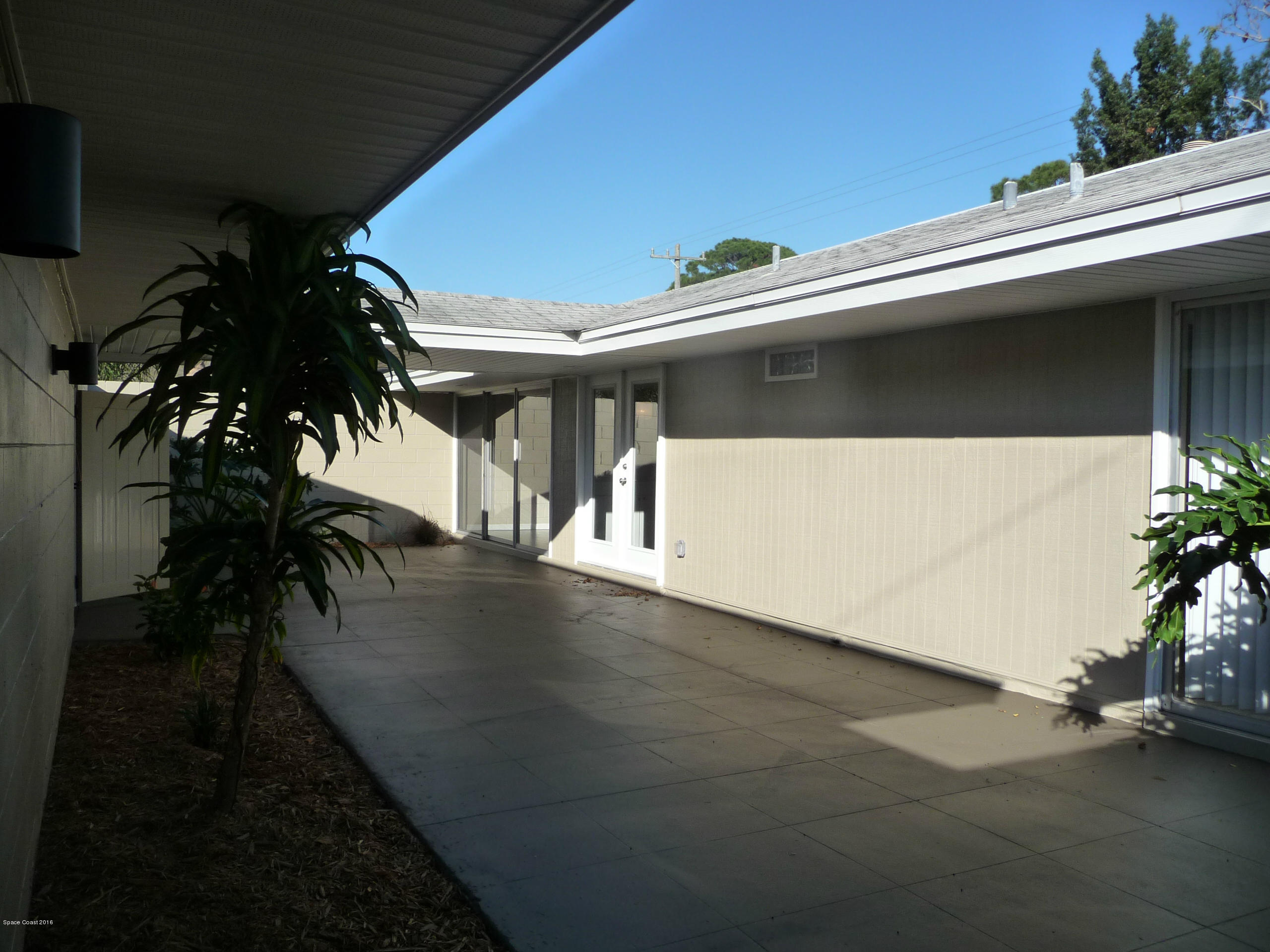 938 Brunswick Lane Rockledge, FL 32955 - Photo 45 of 57 Private Front Courtyard