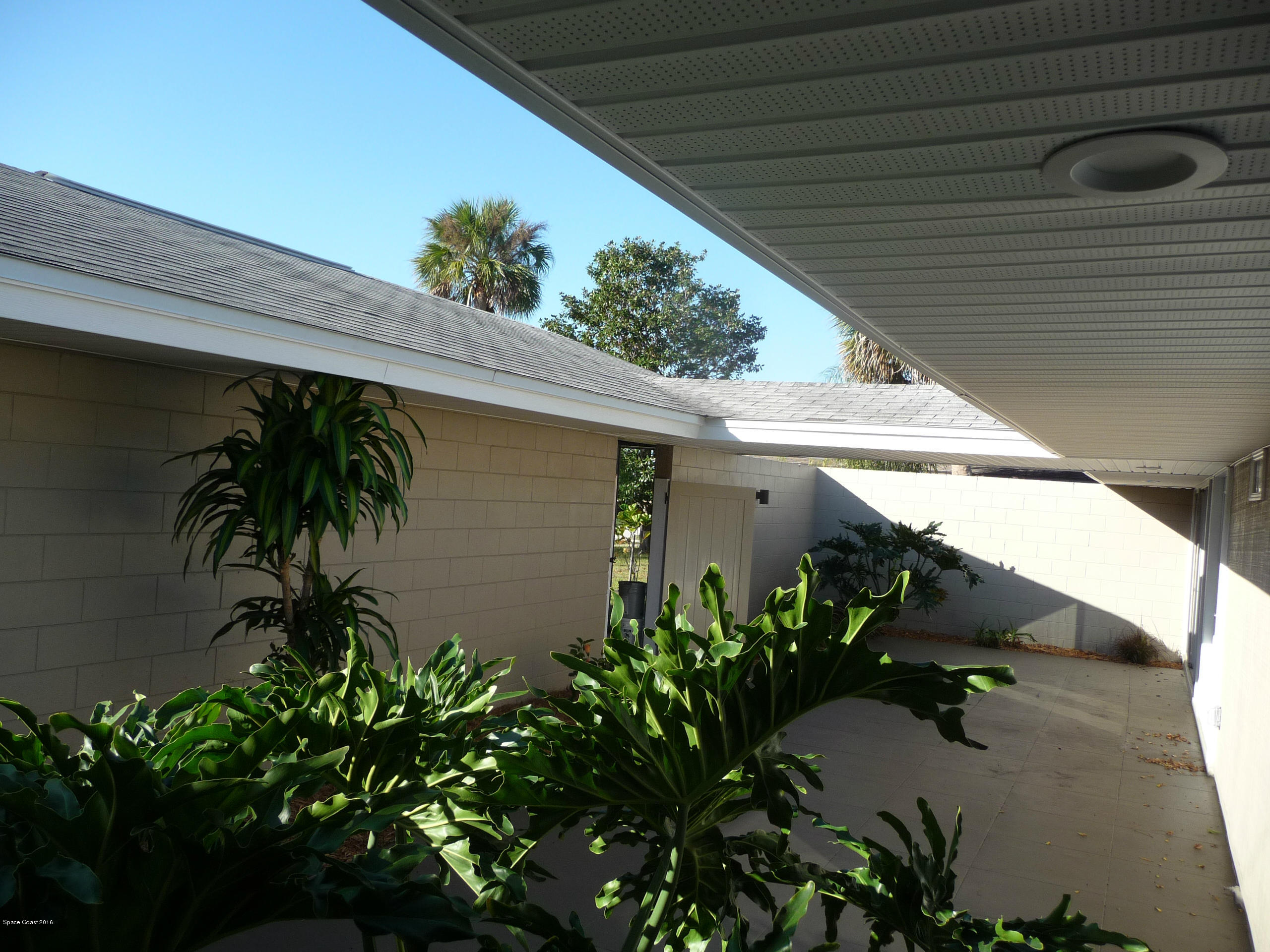 938 Brunswick Lane Rockledge, FL 32955 - Photo 46 of 57 Front courtyard from Master