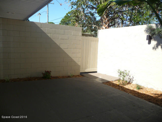 938 Brunswick Lane Rockledge, FL 32955 - Photo 50 of 57 Back courtyard off lv rm fixed gate