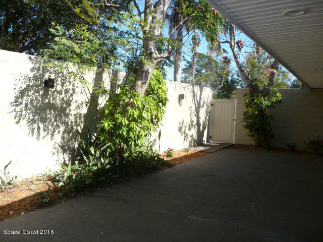 938 Brunswick Lane Rockledge, FL 32955 - Photo 52 of 57 Back courtyard with lockable gate