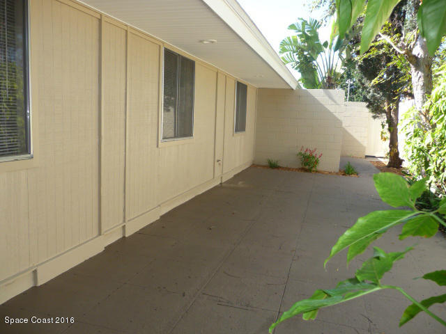 938 Brunswick Lane Rockledge, FL 32955 - Photo 54 of 57 Plenty of room for hammock and furniture