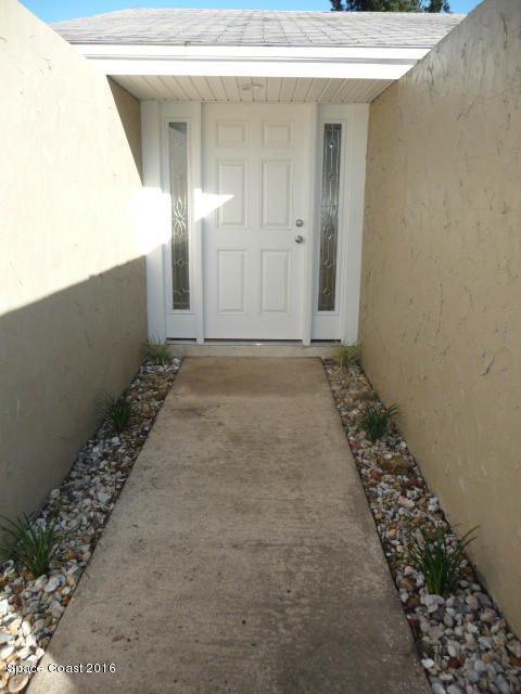 938 Brunswick Lane Rockledge, FL 32955 - Photo 8 of 57 Welcoming front door