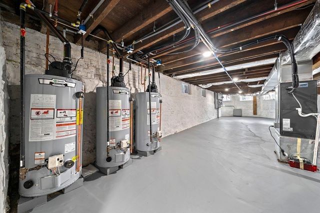 a view of empty room with wooden ceiling