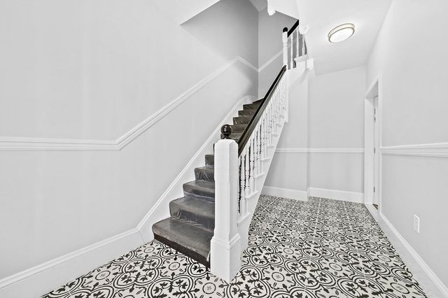 a view of entryway with stairs