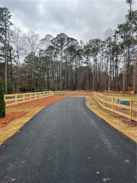 1702 Cunningham Road Southwest Marietta, GA 30008 - Photo 6 of 8 a view of a tennis court