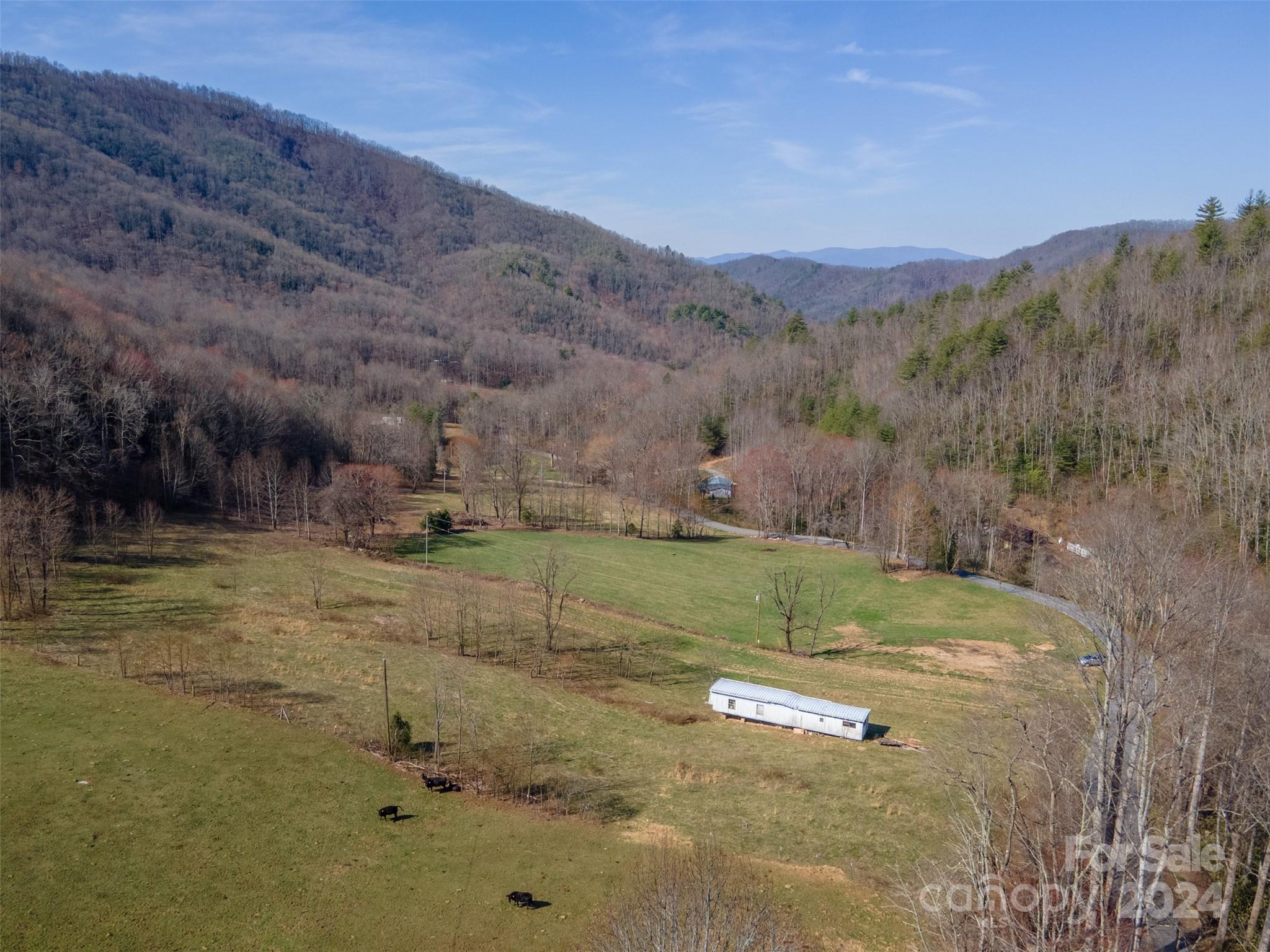 3800 Franks Creek Road Robbinsville, NC 28771 - Photo 19 of 22 a view of a town with mountains in the background