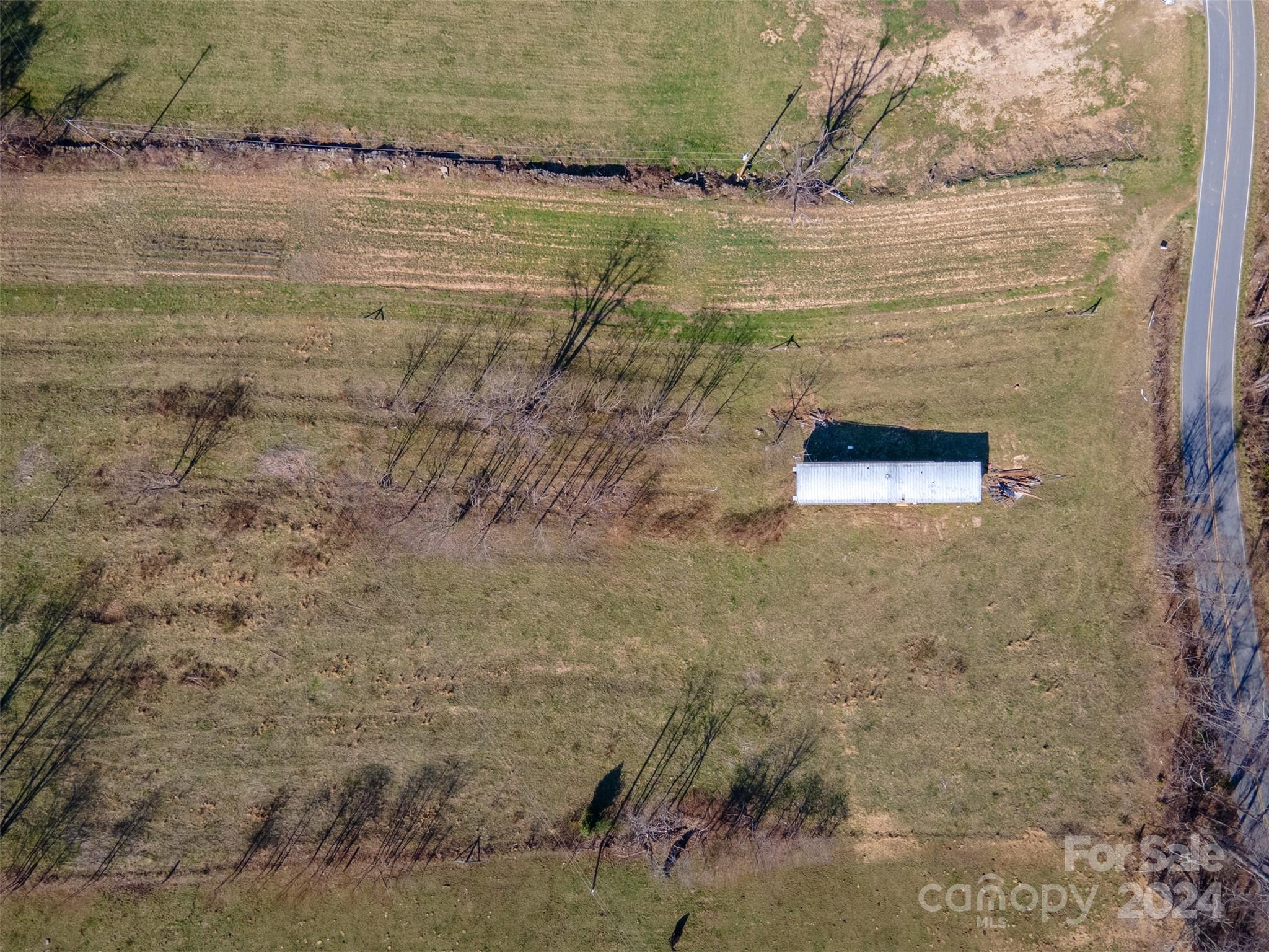 3800 Franks Creek Road Robbinsville, NC 28771 - Photo 20 of 22 a view of a lake with a yard