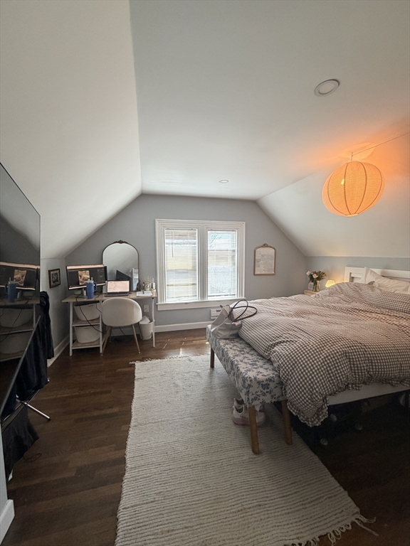 562 East 7th Street, Unit 2 Boston, MA 02127 - Photo 14 of 18 a bed room with a bed and a chair
