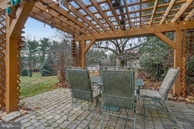 a view of entryway with wooden floor and stairs