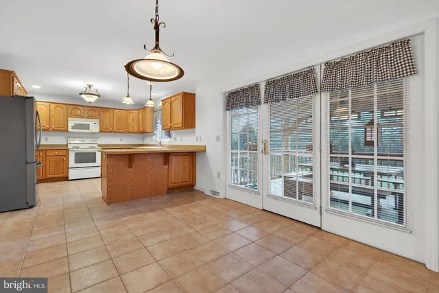 an empty room with a empty space and a window