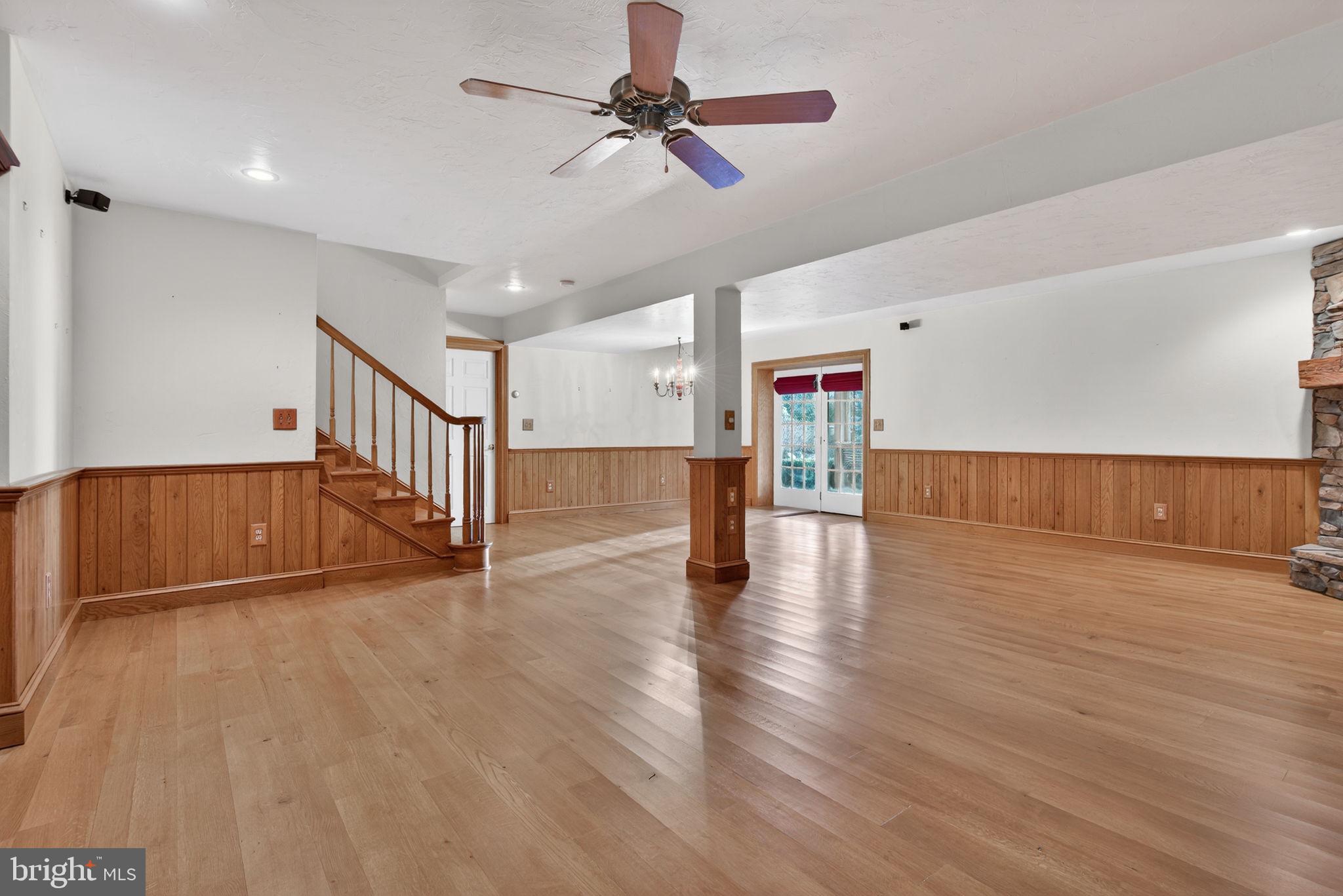 817 Aarons Lane Manheim, PA 17545 - Photo 47 of 64 a view of empty room with wooden floor and fan