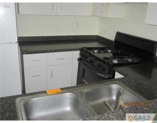 231 Edpas Road New Brunswick, NJ 08901 - Photo 5 of 10 a close view of sink and stove