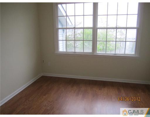 231 Edpas Road New Brunswick, NJ 08901 - Photo 7 of 10 an empty room with a window