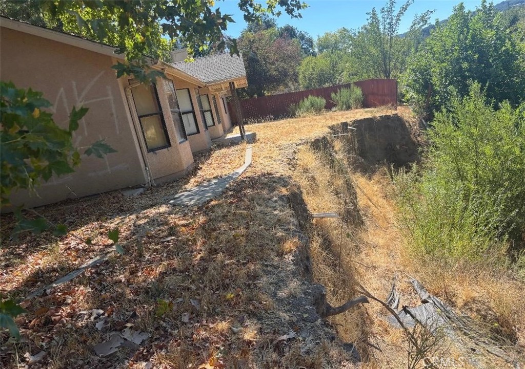 a view of outdoor space and yard