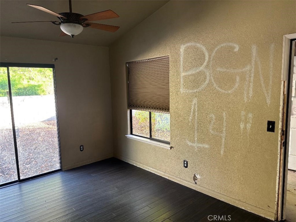 1210 San Ramon Road Atascadero, CA 93422 - Photo 18 of 21 an empty room with wooden floor and windows