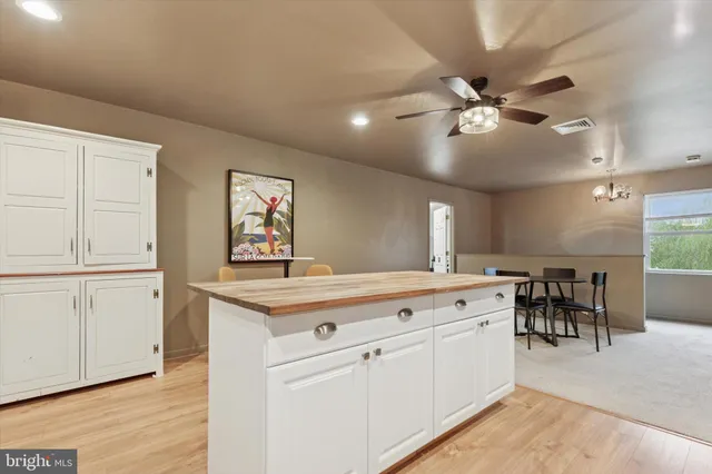 a view of a kitchen counter space and window