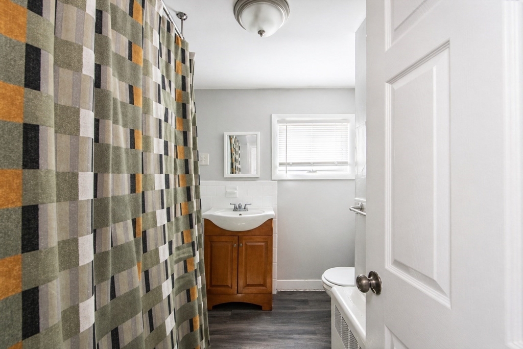 801 North Main Street Fall River, MA 02720 - Photo 12 of 20 a bathroom with a sink toilet and shower