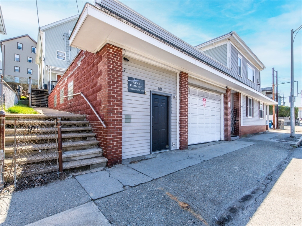801 North Main Street Fall River, MA 02720 - Photo 2 of 20 a front view of a house with a stairs