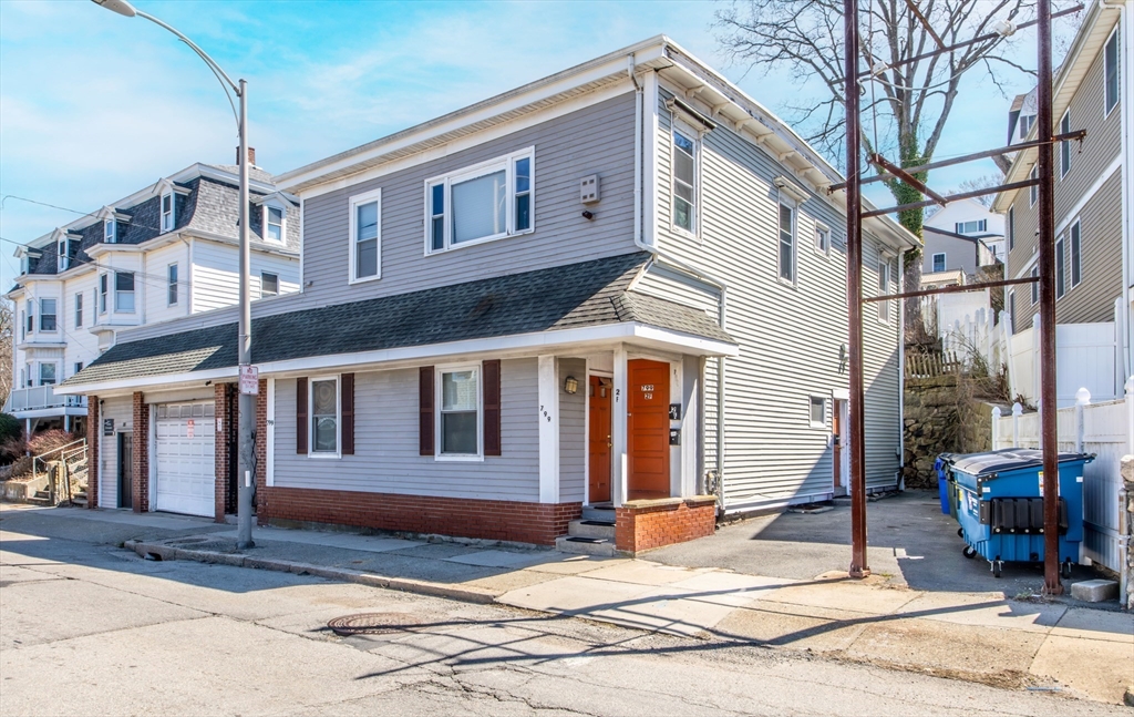 801 North Main Street Fall River, MA 02720 - Photo 3 of 20 a view of a house with a patio