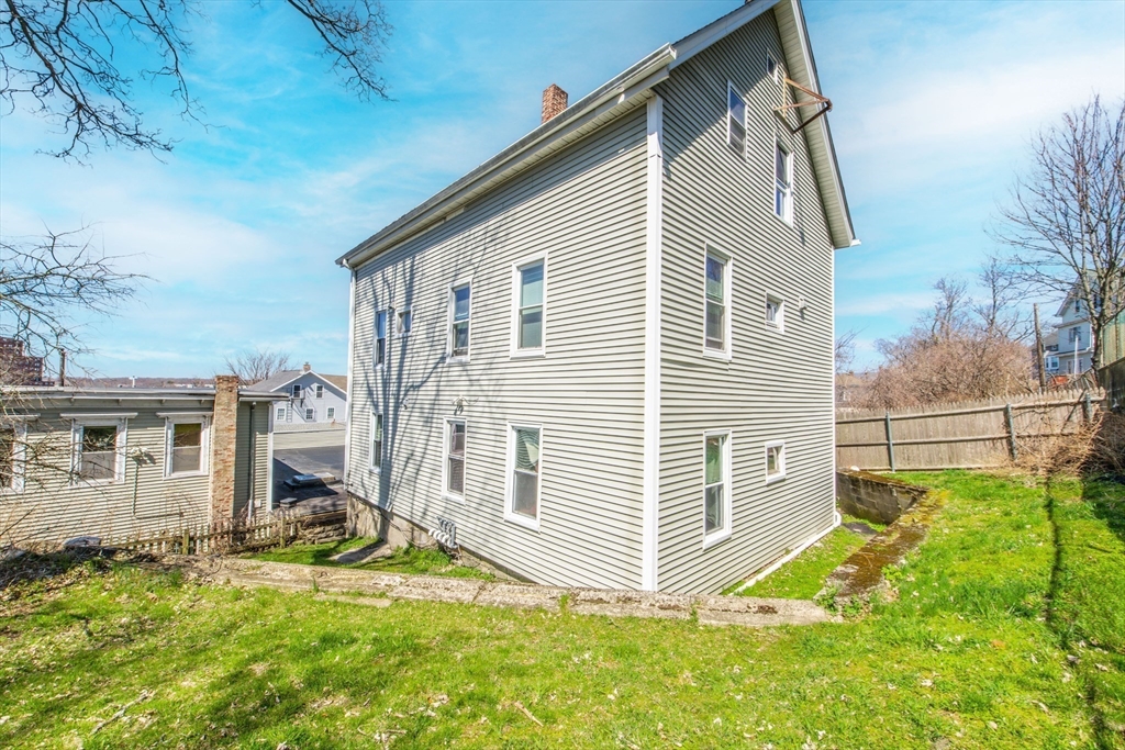 801 North Main Street Fall River, MA 02720 - Photo 4 of 20 a view of a house with backyard