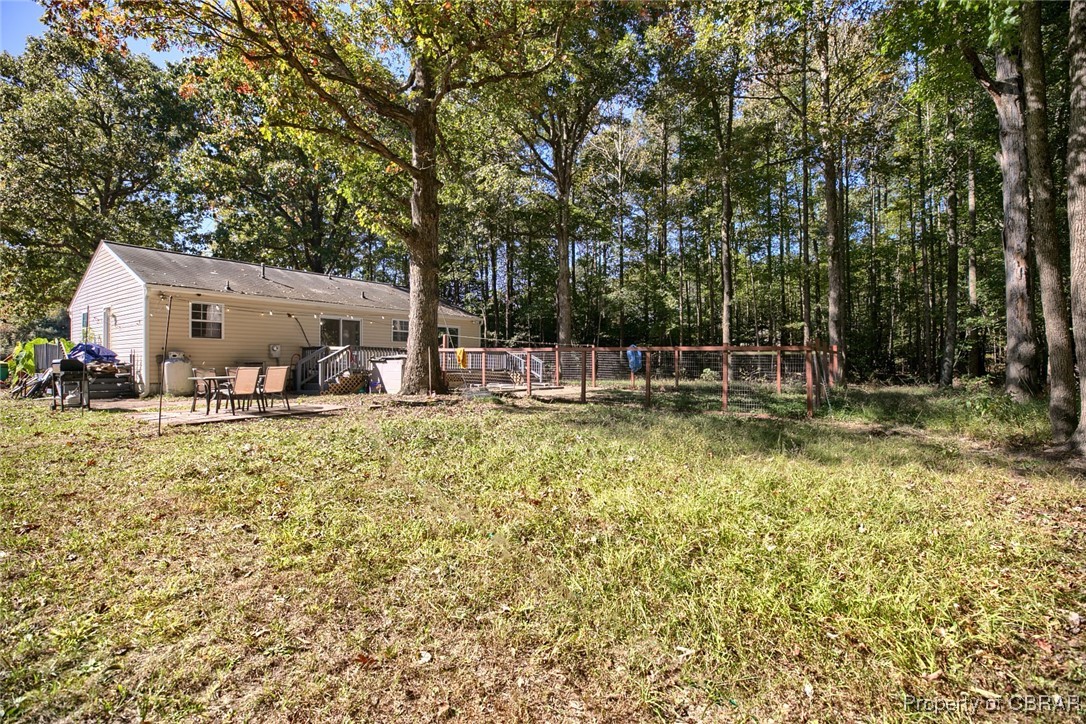 6153 Fletcher Road Gloucester, VA 23061 - Photo 15 of 16 View of yard featuring a patio