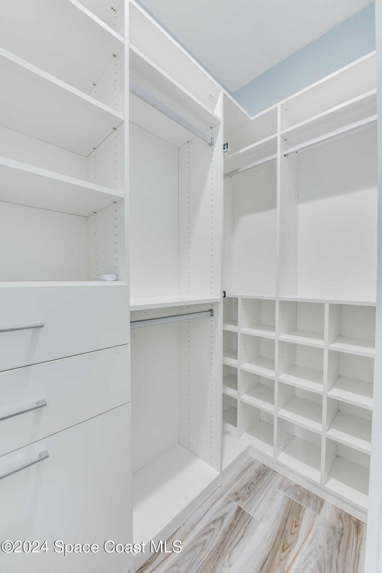 4153 Red Bay Street Grant, FL 32949 - Photo 37 of 63 a view of an empty walk in closet