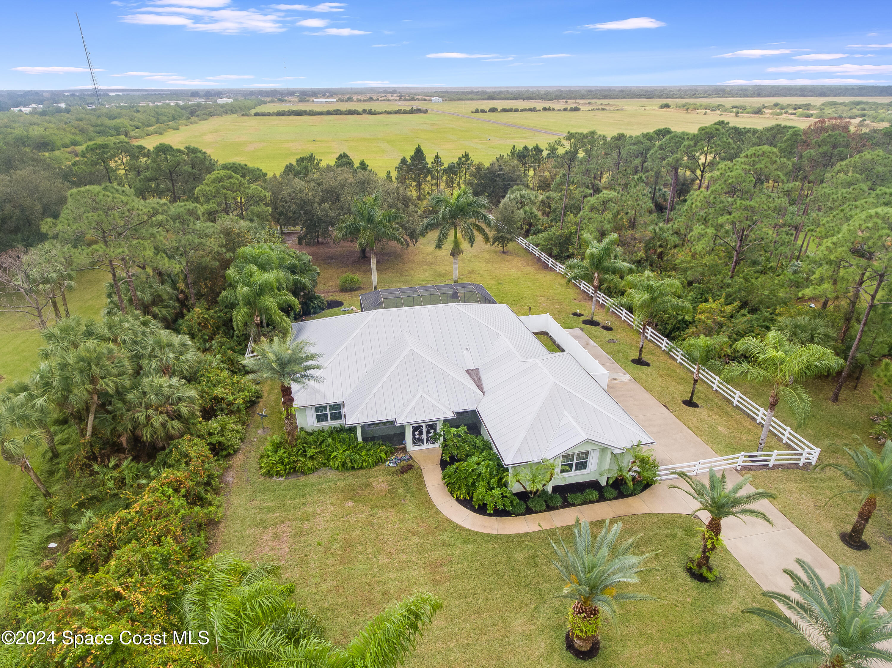 4153 Red Bay Street Grant, FL 32949 - Photo 5 of 63 an aerial view of residential houses with outdoor space and river