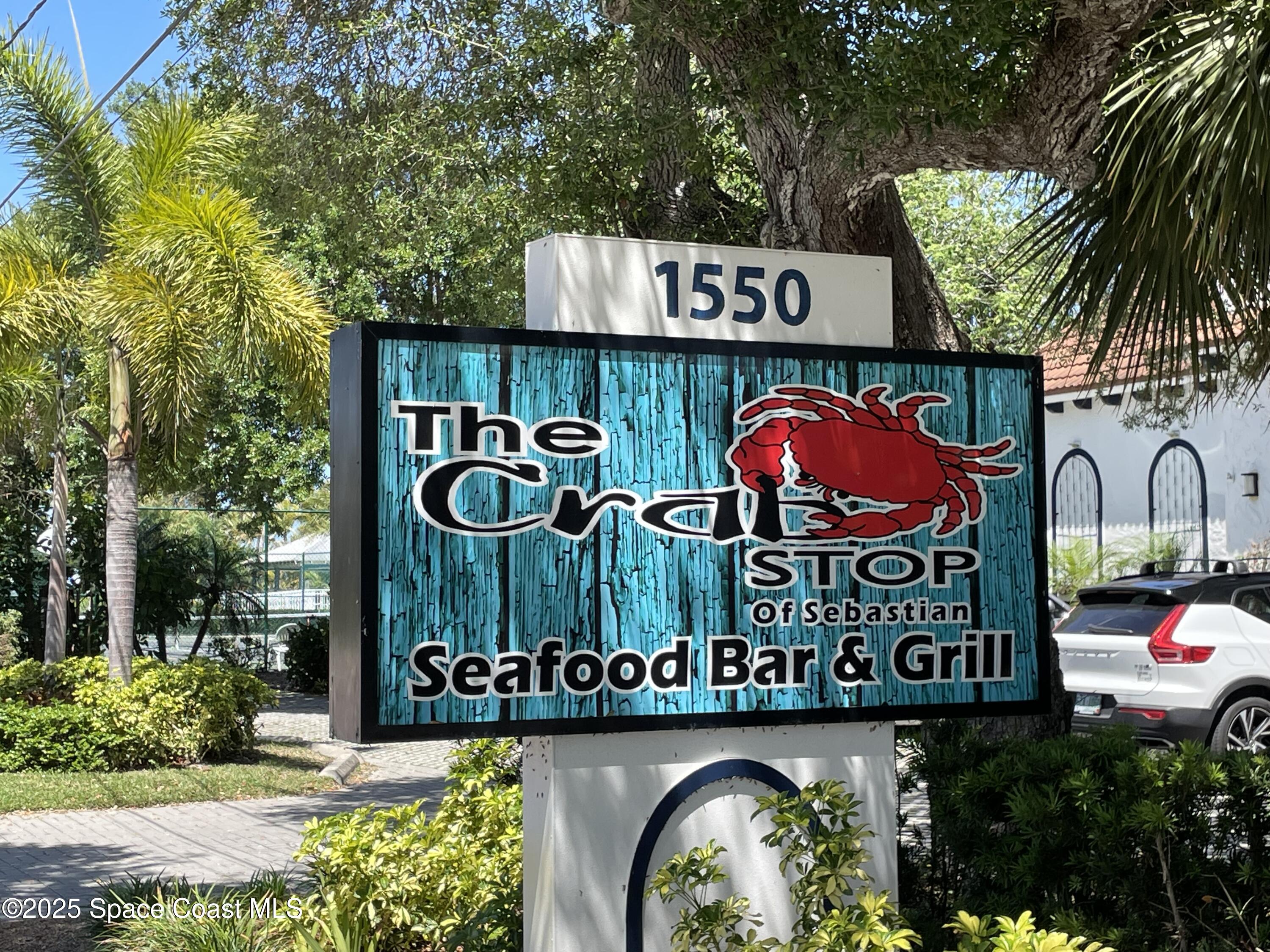 4153 Red Bay Street Grant, FL 32949 - Photo 62 of 63 a street sign that is on a pole