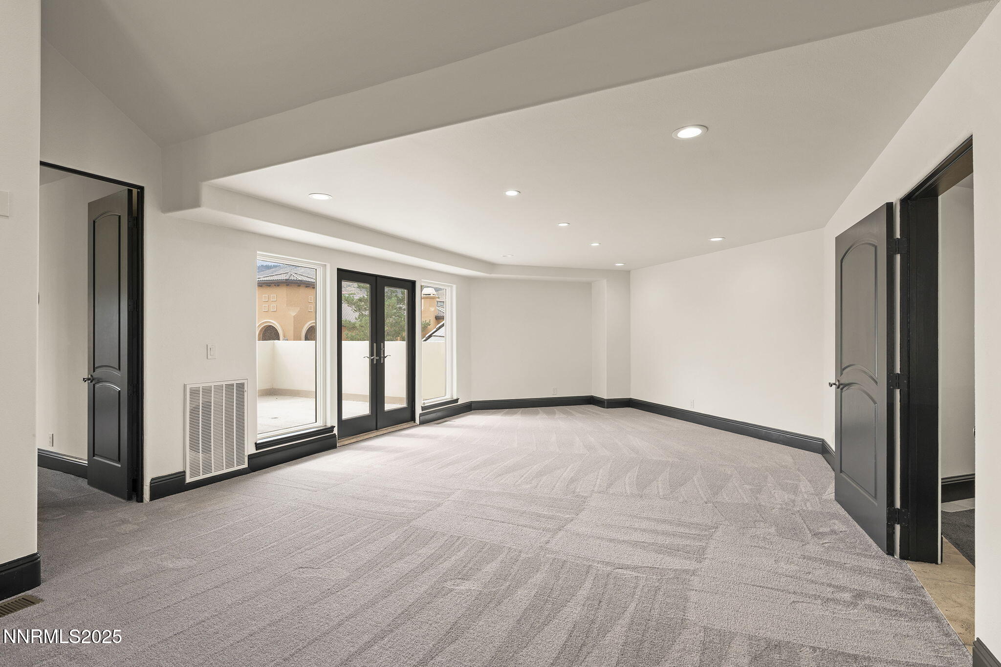 3653 Spirit Bluff Court Reno, NV 89511 - Photo 35 of 46 a view of an empty room with glass door