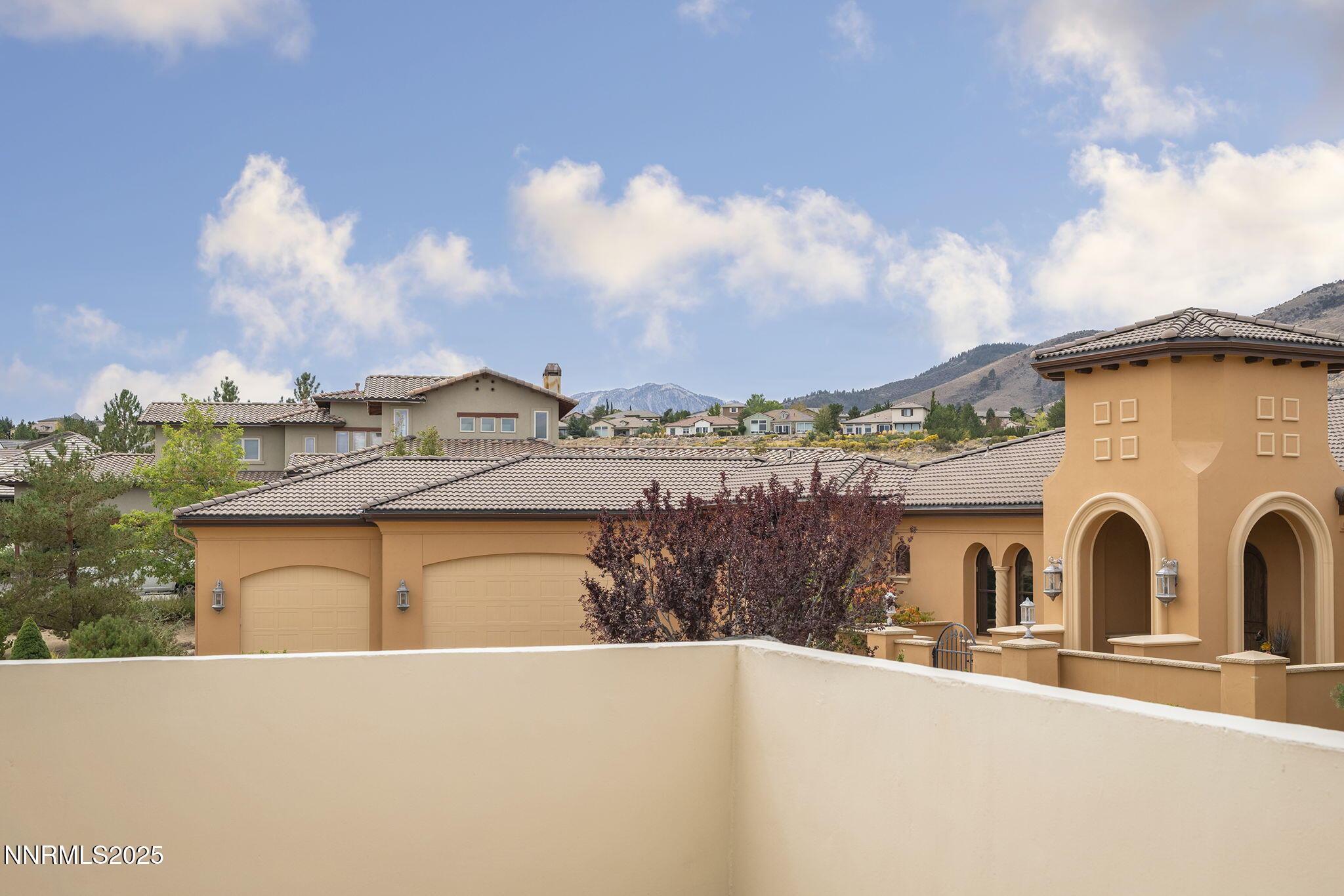 3653 Spirit Bluff Court Reno, NV 89511 - Photo 39 of 46 a view of building with lake view and mountain view