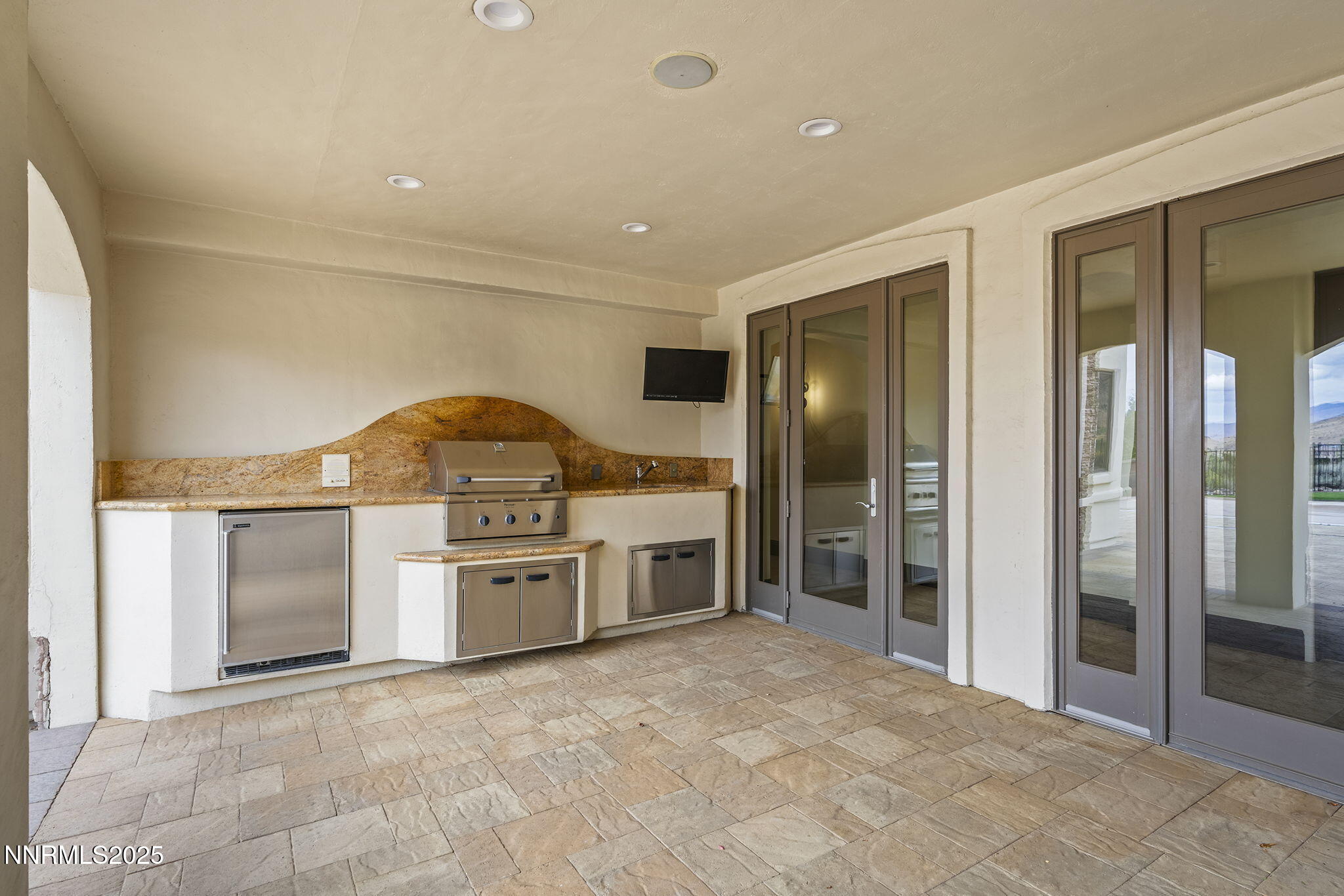 3653 Spirit Bluff Court Reno, NV 89511 - Photo 46 of 46 a large kitchen with a stove and a sink