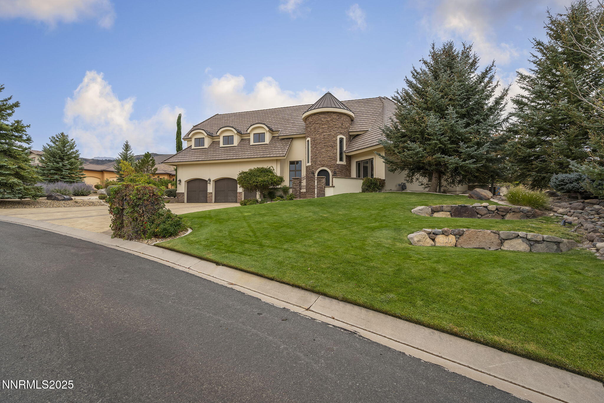 3653 Spirit Bluff Court Reno, NV 89511 - Photo 7 of 46 a view of a street with a house in the background