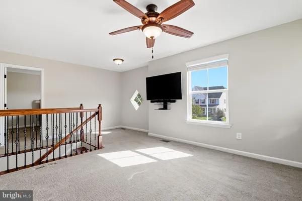 a view of livingroom with furniture flat screen tv