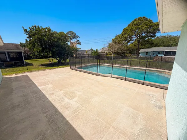 a view of a house with a swimming pool