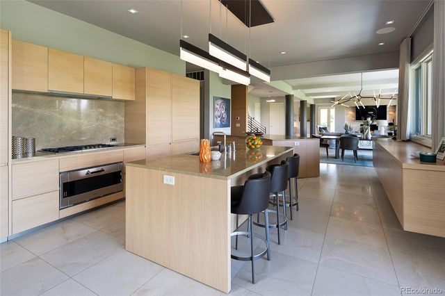 a kitchen with counter top space cabinets and stainless steel appliances