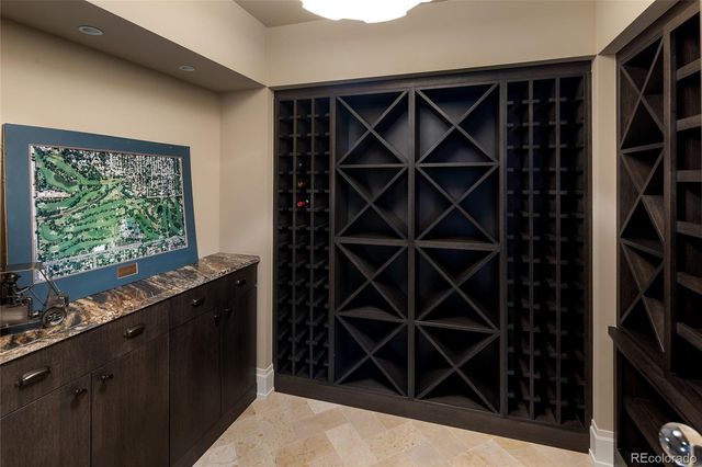 a view of a patio with couches table and chairs and potted plants